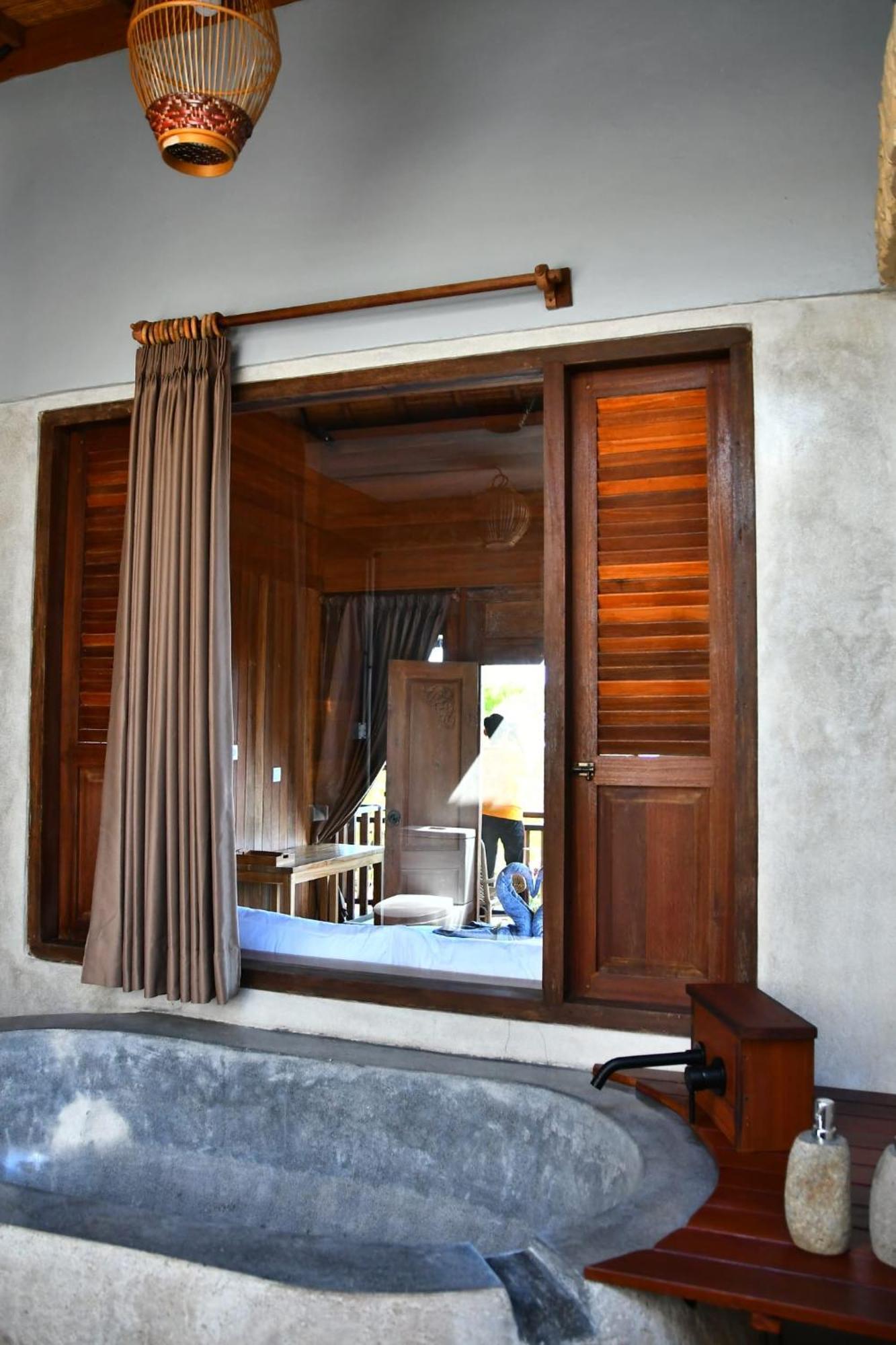 Putra'Lebah Amed Guest House Dış mekan fotoğraf